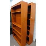 Two teak veneered open bookcases.