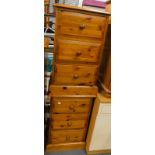 A pair of pine three drawer bedside chests, 68cm high, 43cm wide.