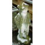A moulded composition garden ornament, in the form of a young boy, 65cm high.