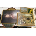 An Edwardian oval wall mirror and various prints.