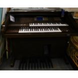 A Yamaha electric Electone AR-100 keyboard organ.