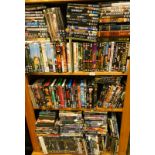 A large quantity of DVD's. (3 shelves)