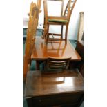 An oak blanket box, mahogany extending dining table, four chairs and a wooden step ladder.