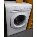 A Hotpoint Aquarius washing machine.