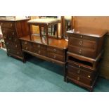 A Stag Minstrel part bedroom suite, to include chest of drawers, two bedside chests and a dressing