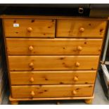 A pine chest of two short and four long drawers.