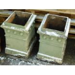 A pair of painted terracotta rectangular chimney pots, 43cm high, 33cm wide.