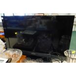 A Sony Bravia 31" television, with leads, remote and instructions.