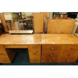 A 1960s/70s oak retro three drawer chest of drawers, and matching dressing table. (2)