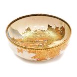 A Japanese Satsuma bowl, decorated with women walking in front of The Golden Pavilion in Kyoto,