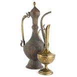 Withdrawn pre sale by vendor. A late 19thC/early 20thC Eastern copper and brass coffee pot, with