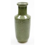 A Chinese celadon porcelain baluster vase, with relief dragon among scrolling flowers between