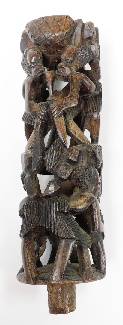 A 20thC African tribal carved pillar, of four sections formed as many figures with elaborate hair - Image 4 of 11