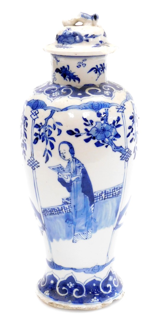 A Chinese blue and white porcelain baluster jar and cover, decorated with panels of women