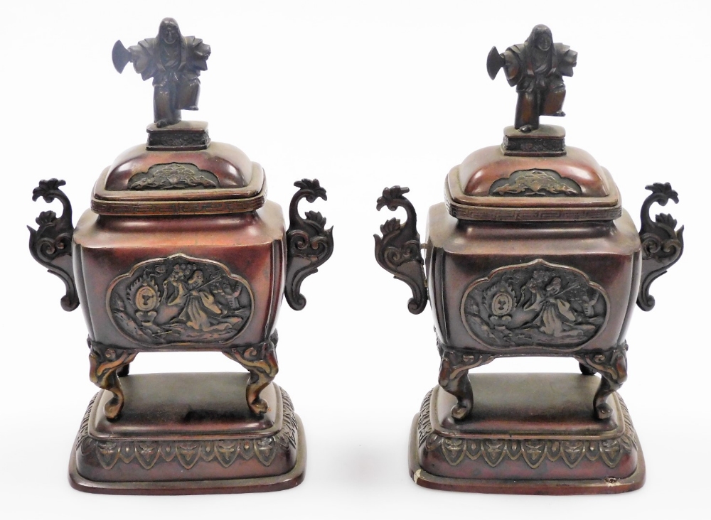A pair of Japanese bronze incense burners, each with domed lids with Sambaso dancer knops, the