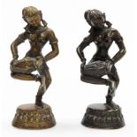 A near pair of Indian Hindu bronze figures of Parvati, modelled standing on one leg, holding a