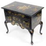 An early 20thC Oriental style black lacquer cabinet, decorated with gold figures on horseback with