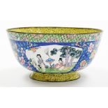 An early 20thC Chinese Canyon enamel bowl, the outside decorated with panels of figures and