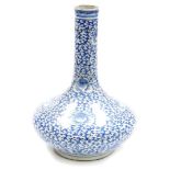 A Chinese porcelain blue and white bottle vase, with slender neck decorated with an all over