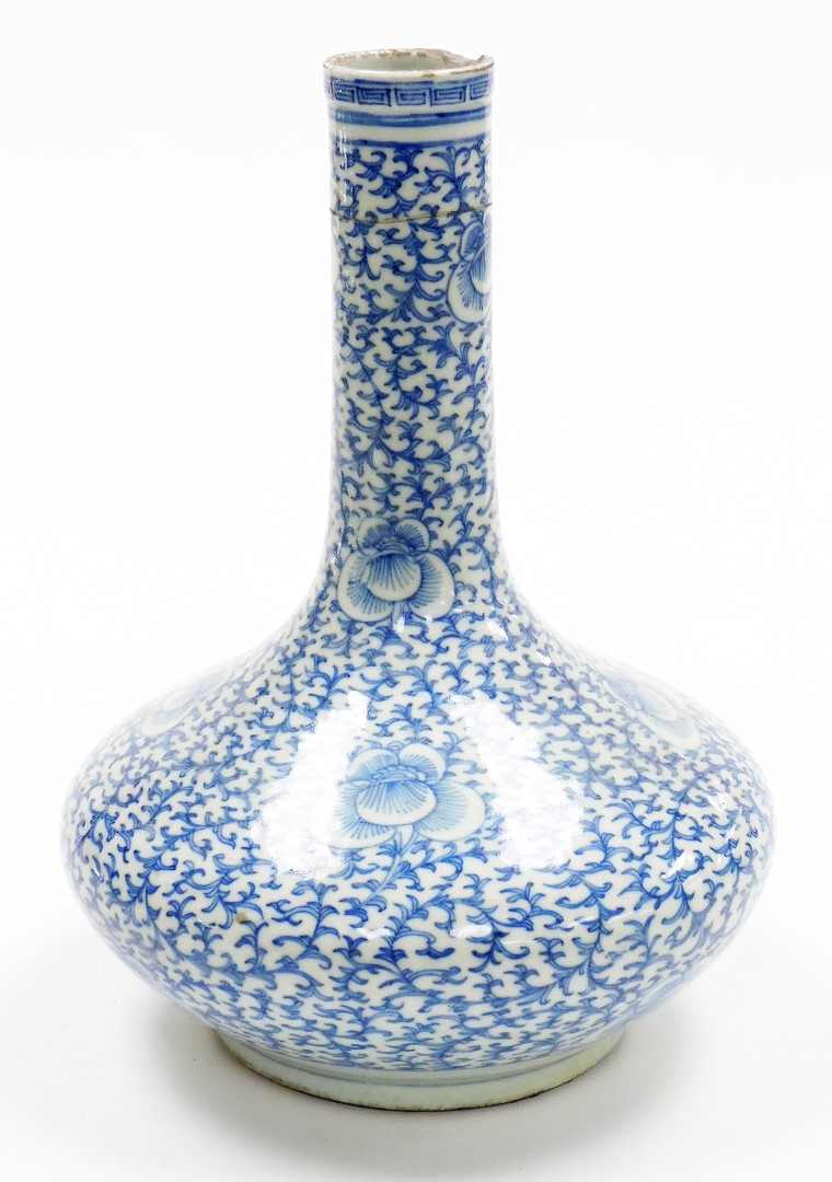 A Chinese porcelain blue and white bottle vase, with slender neck decorated with an all over - Image 3 of 6