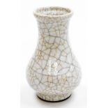 A Chinese crackle glaze white porcelain vase, of baluster form, 91cm high.
