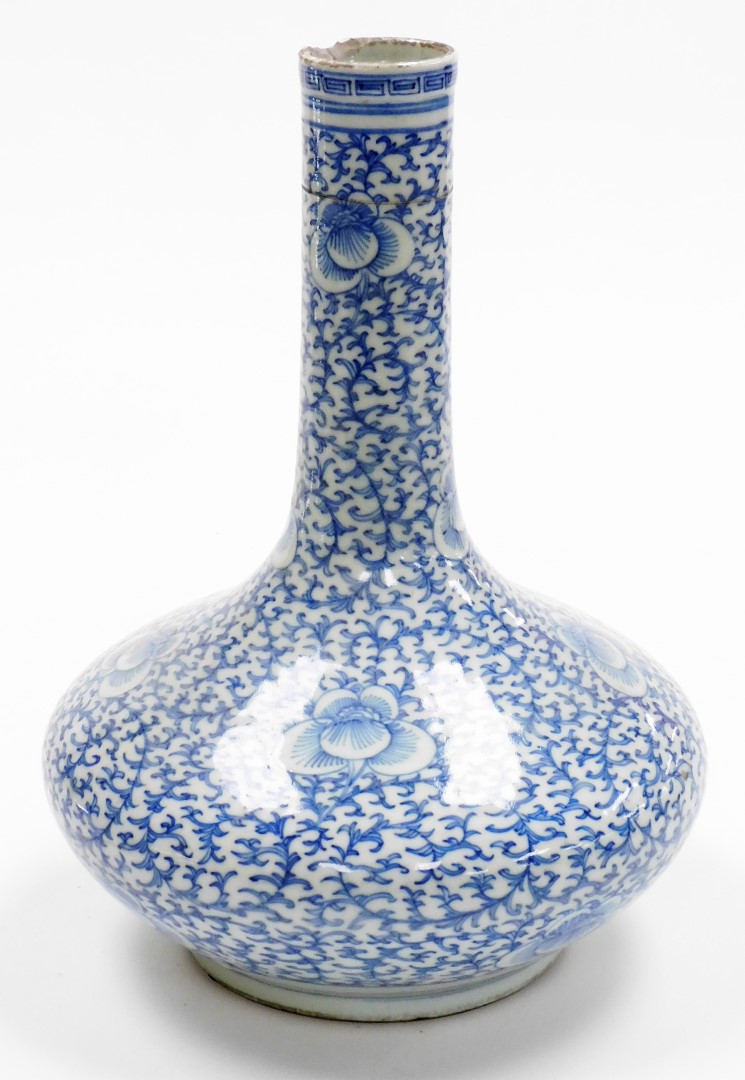 A Chinese porcelain blue and white bottle vase, with slender neck decorated with an all over - Image 2 of 6