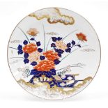 A late 20thC Japanese charger, in an Imari style palette, decorated with flowers with gilt