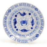 A late 19th/early 20thC Chinese blue and white saucer dish, decorated with fish, crabs, etc., in