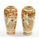 A pair of signed Japanese Satsuma baluster vases, each depicting figure of geisha, with autumnal