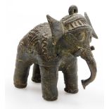 An Indian bronze figure of an elephant, modelled standing with all over decoration, 8.5cm wide.