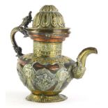 Withdrawn pre sale by vendor. A late 19thC Chinese brass and copper teapot, with an embossed and