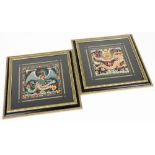 A pair of 20thC Chinese silk embroideries, in the style of rank badges depicting a dragon with