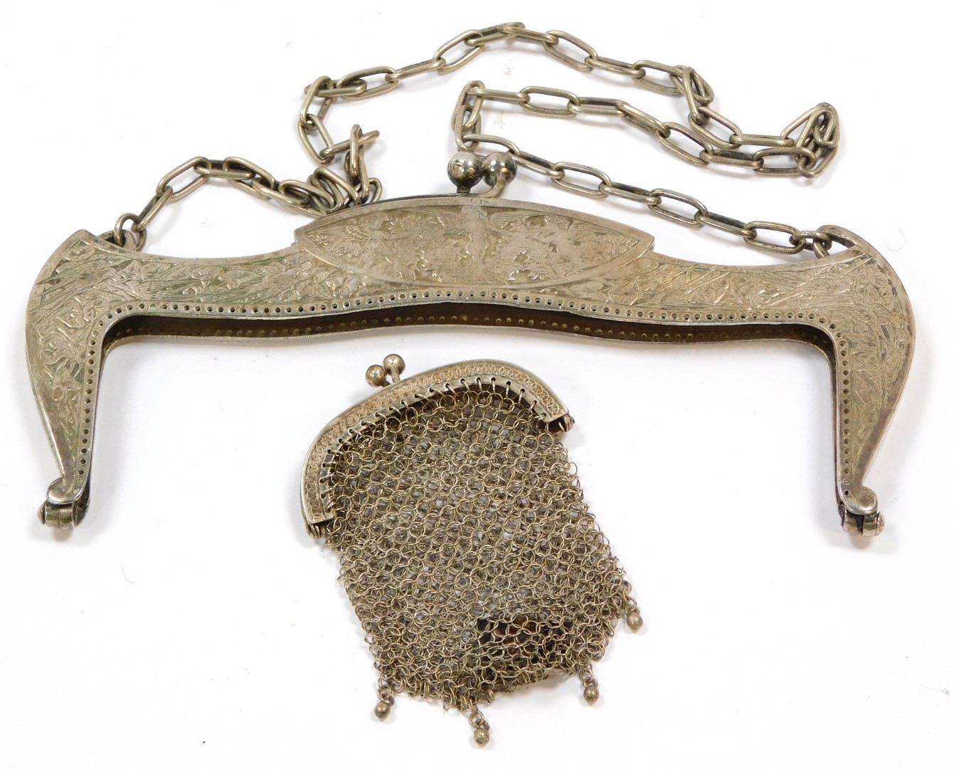 A Continental late 19thC bag clasp and chain, metal stamped 800, engraved with cherubs, birds and