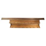 A late 19thC oak wall hanging coat rack, 151cm wide., another similar, 182cm wide., and a wall