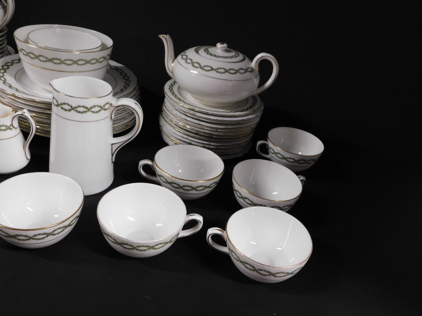 A Royal Doulton early 20thC porcelain tea and coffee service, decorated with a band of green - Image 2 of 5