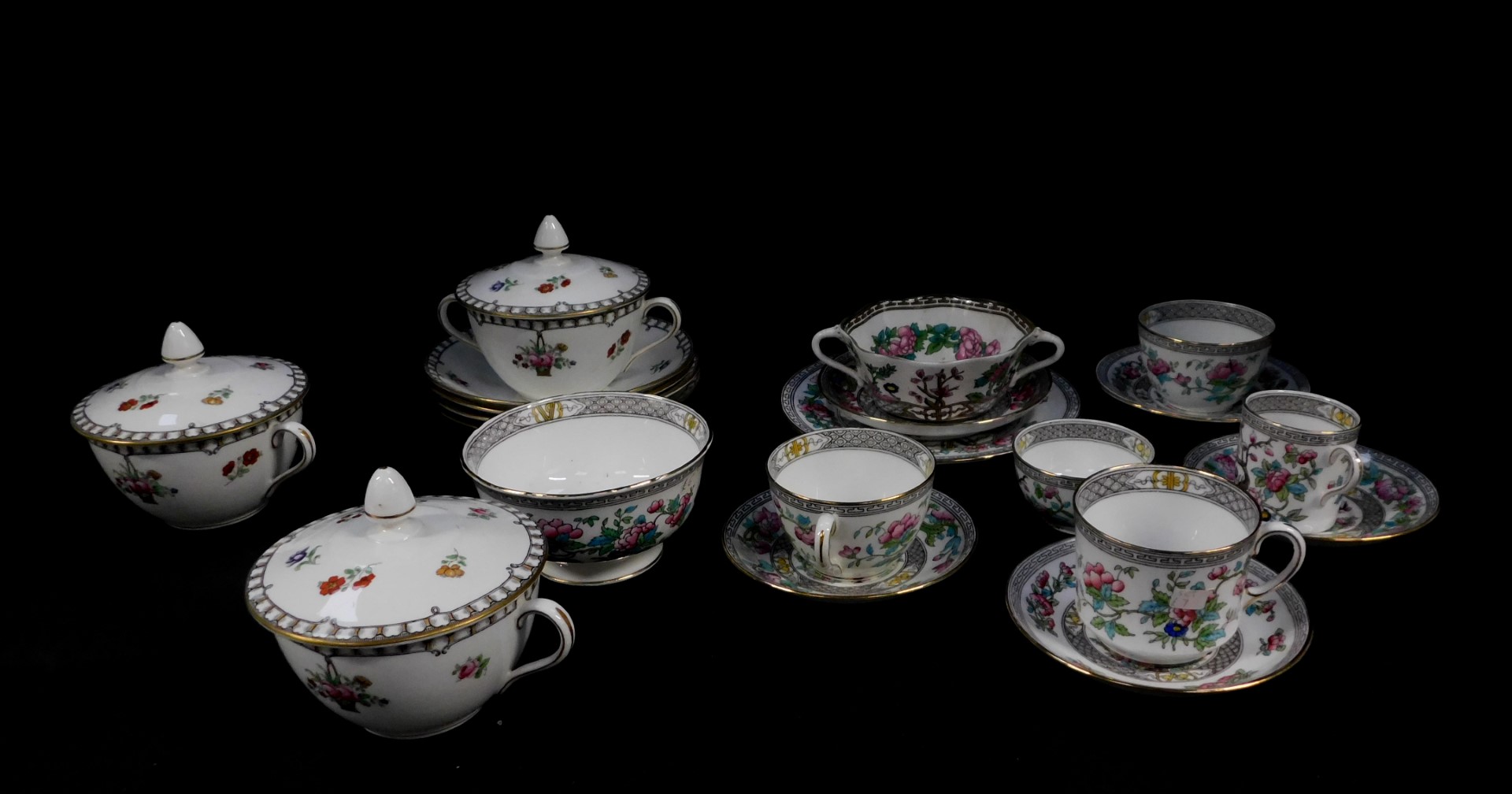 A group of Aynsley porcelain, including three soup cups, covers and four saucers, decorated with