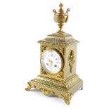 A late 19thC French brass cased mantel clock, circular enamel dial bearing Roman and Arabic