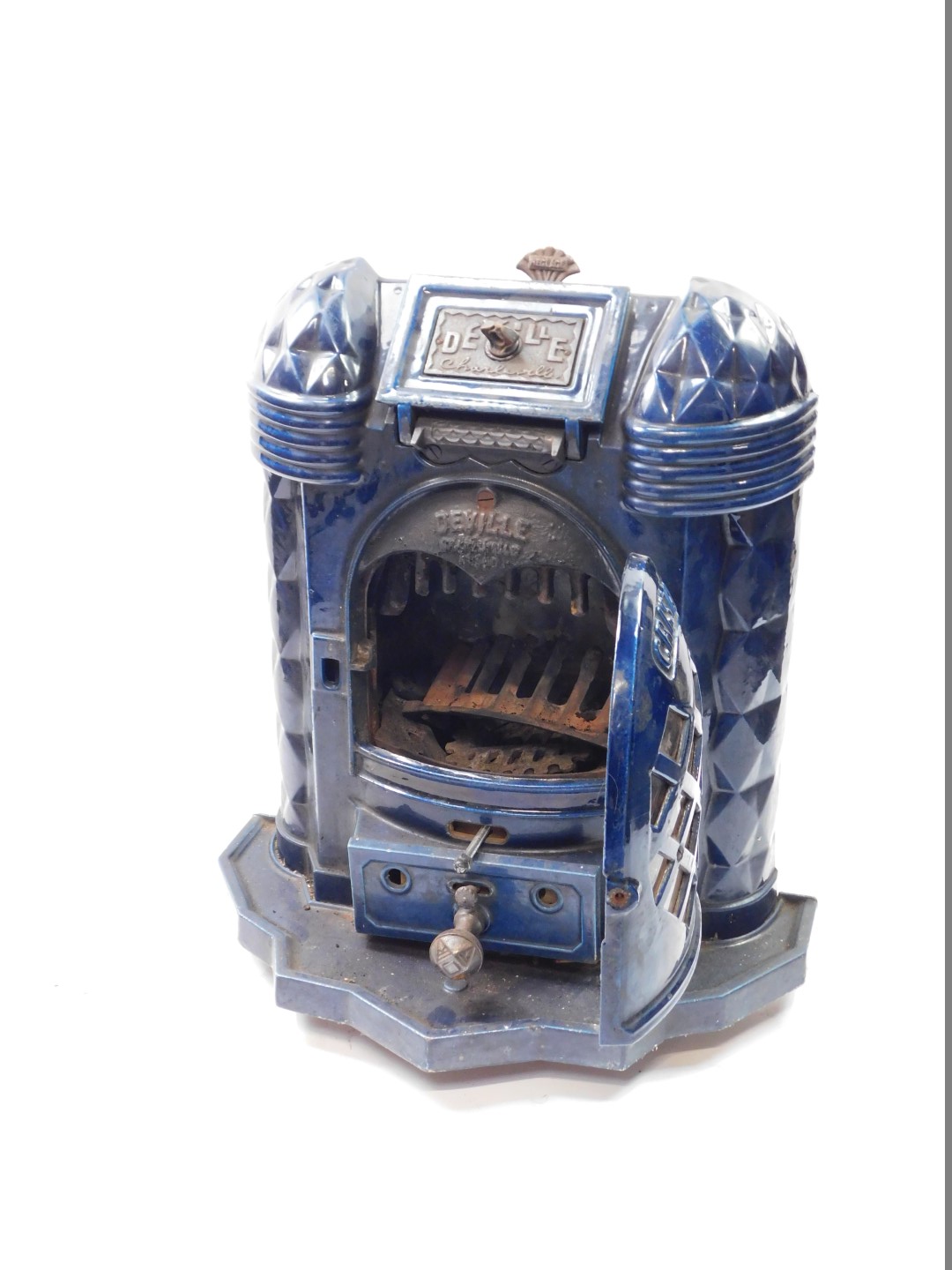 A Deville & Cie of Charleville cast iron and blue enamel Cristal wood burning stove, c1920, with a