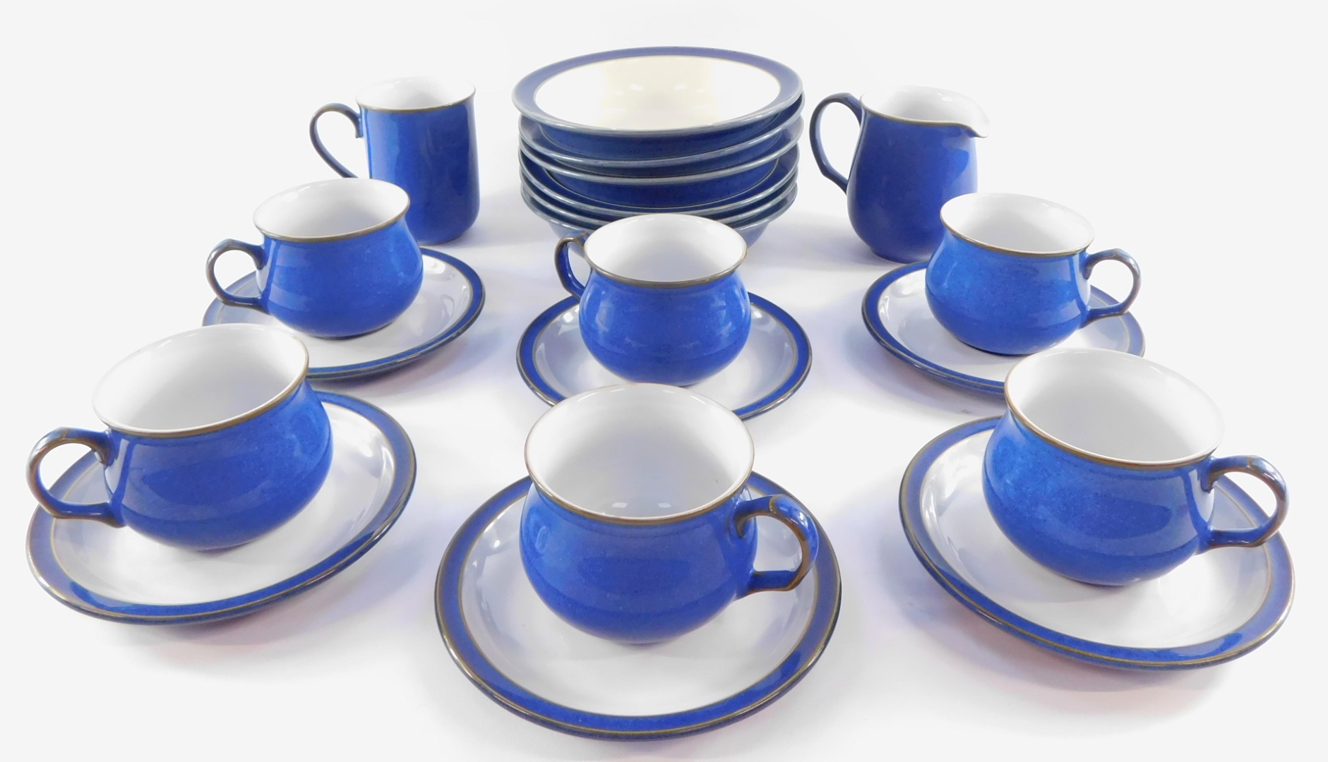 A group of Denby Pottery decorated in the Imperial Blue pattern, comprising six tea cups and
