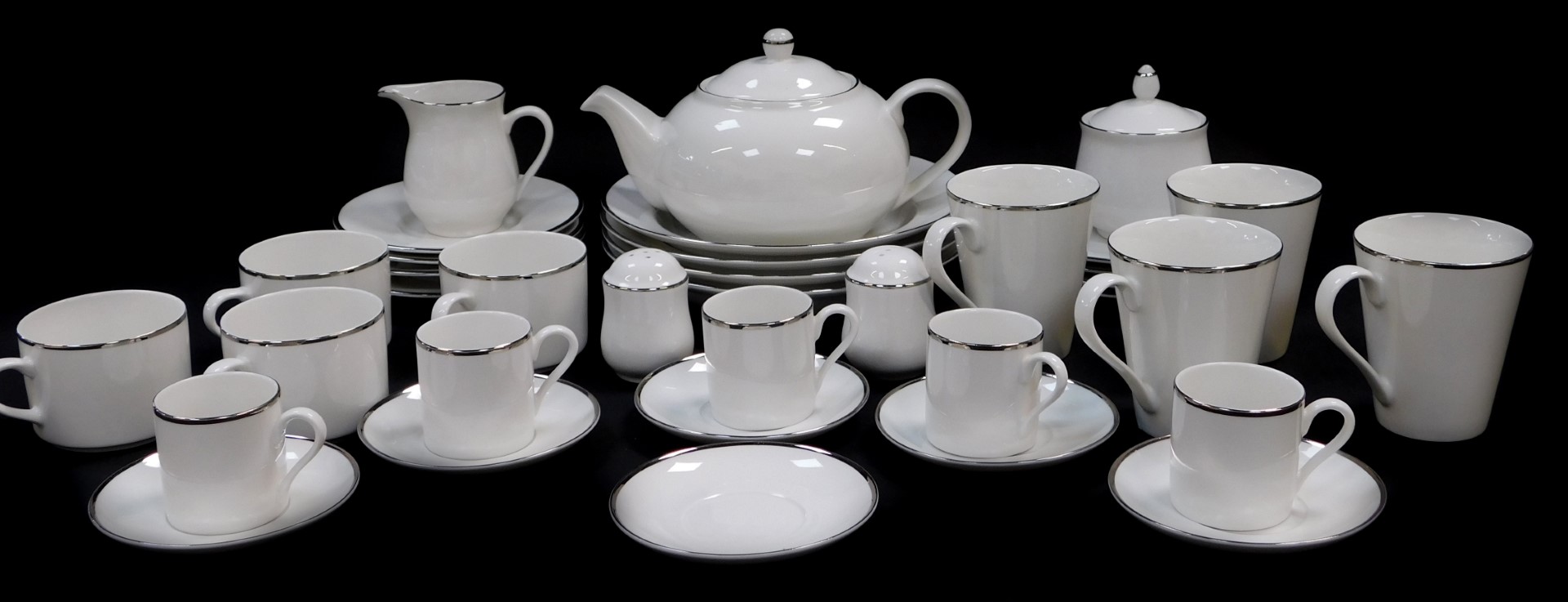 A Maxwell Williams porcelain part breakfast service, decorated in the White Platinum pattern,