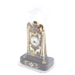 A 19thC continental miniature clock, probably German, circular enamel dial bearing Roman numerals,