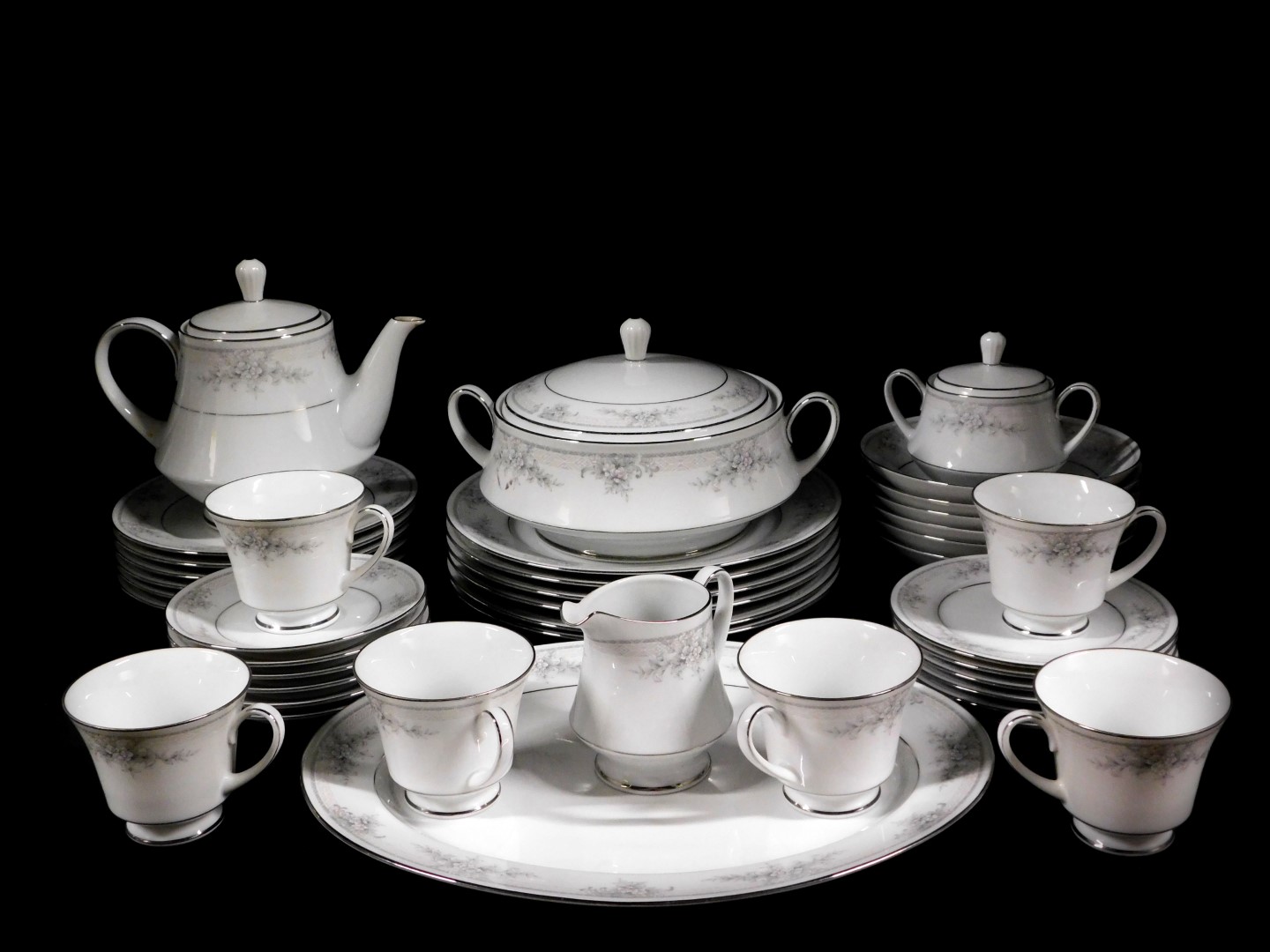 A Noritake porcelain part dinner and tea service decorated in the Sweet Leilani pattern, Legendary