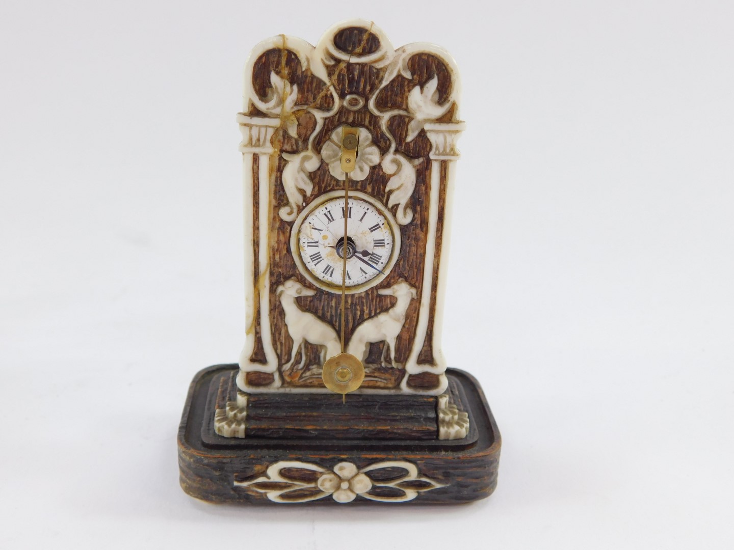 A 19thC continental miniature clock, probably German, circular enamel dial bearing Roman numerals, - Image 3 of 5