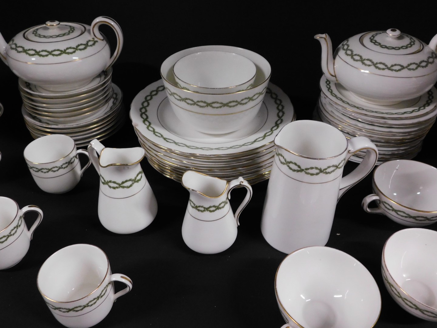 A Royal Doulton early 20thC porcelain tea and coffee service, decorated with a band of green - Image 3 of 5