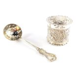 A Victorian silver sugar sifting spoon, Thomas Smily, London 1862, and a Victorian silver dressing