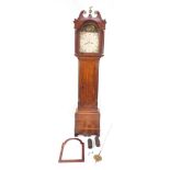 Nelson of Market Deeping. A George III oak and cross banded long case clock, the painted break