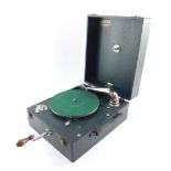 An Alba green cased table top gramophone, 15cm high, 27.5cm wide, 33.5cm deep.