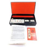 A Continental Mah Jong set, boxed with instructions.