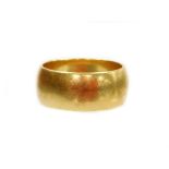 An Edward VII 18ct gold thick wedding band, maker SW, London 1906, ring size N½, 6.8g all in.