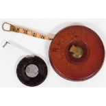 Various leather cased tape measures, to include a leather cased 100ft tape rule, plus a 50ft example